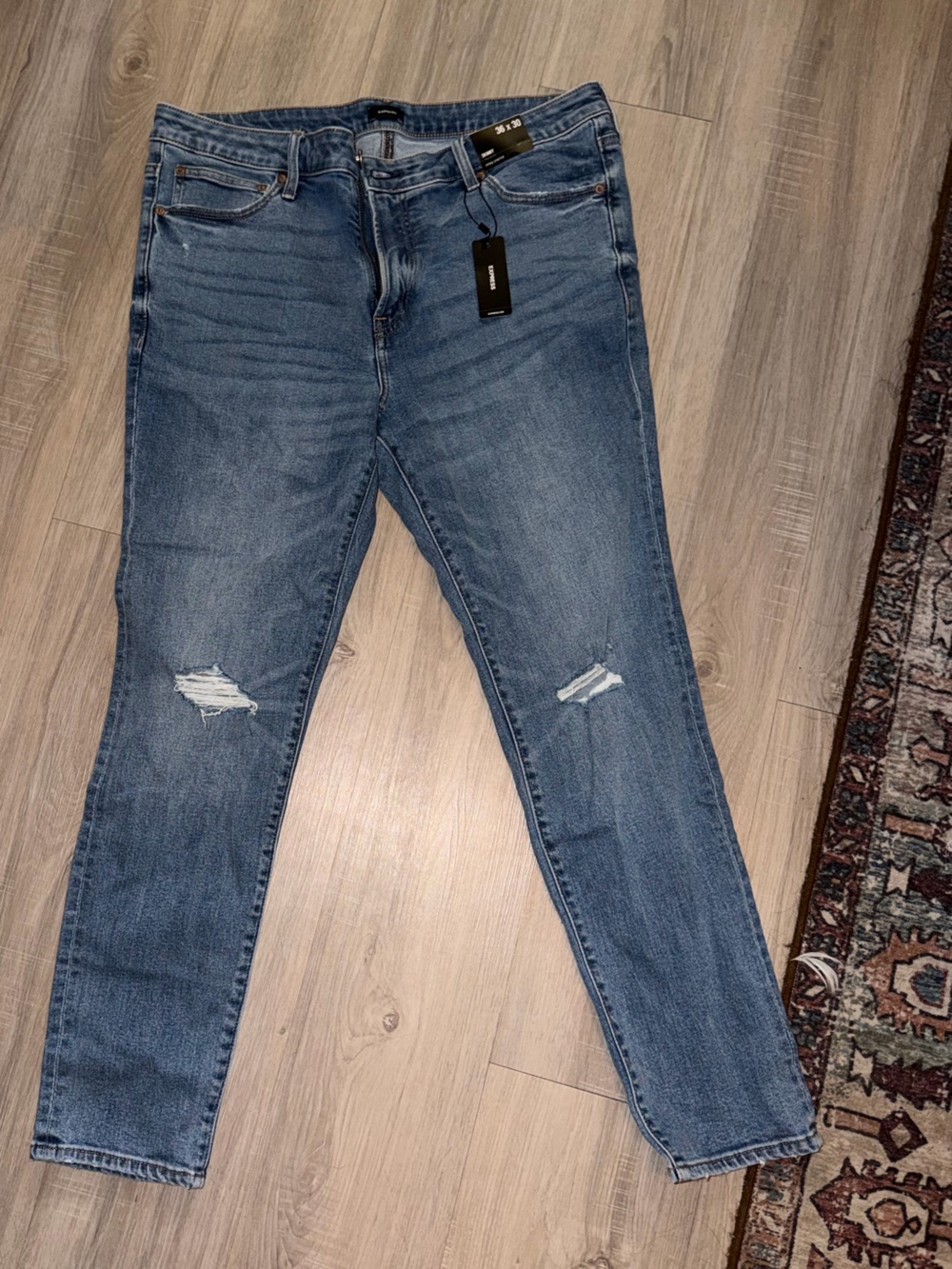 Express Men's Skinny Jeans in Medium Wash Blue with Distressed Knees